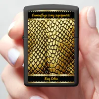 Glistening gold snake skins in light zippo lighter