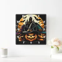 Spooky pumpkin display with witches and a castle square wall clock