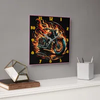 Fiery motorcycle roaring through a blazing night square wall clock