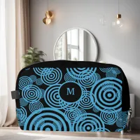 Modern, trendy blue circles on black monogram  dopp kit