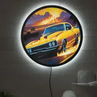 Vibrant hotrod racing into a sunset blaze LED sign