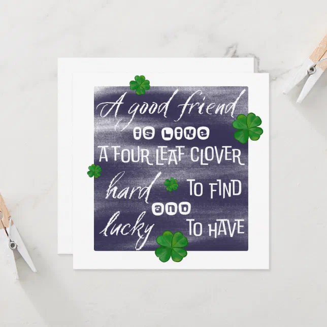 Proverb on friendship surrounded with clovers