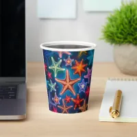 Cute colorful little starfish in sea  paper cups
