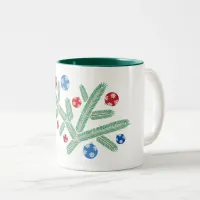 Christmas tree branch with snowflake decorations Two-Tone coffee mug