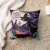 A witch brews potions under the full moon throw pillow