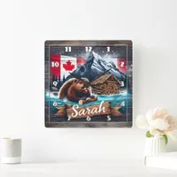 Canadian Beaver in Water With Logs Near Mountains Square Wall Clock