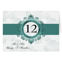 aqua monogram table seating card