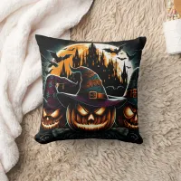 Glowing pumpkins shine under the moon throw pillow