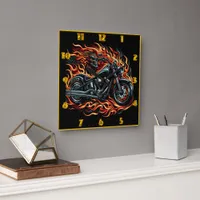 Fiery motorcycle blazing through darkened streets square wall clock