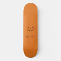 Orange and Scary Carved Pumpkin Face Skateboard