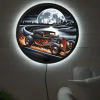 A hotrod races under a full moonlit sky at dusk LED sign