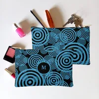 Modern, trendy blue circles on black monogram  accessory pouch