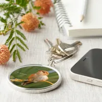 Stunning Rufous Hummingbird Perching on Plant Keychain