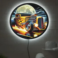 Vintage hotrod racing under a full moon glow LED sign