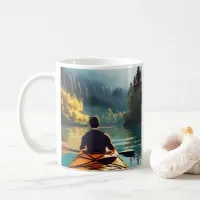 Man Kayaking on a lake surrounded by Trees  Coffee Mug