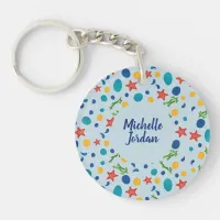 Summer beach with starfish, shells and pebbles keychain