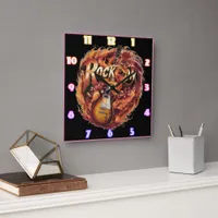 Guitar in flames with notes at dusk square wall clock