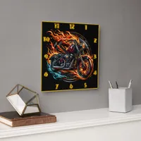 Fiery motorcycle racing down the open road at dusk square wall clock