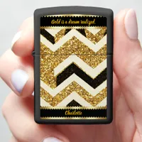 Gleaming gold and black zigzag pattern on marble zippo lighter