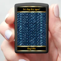 Blue snake skins gleam in sunlight zippo lighter