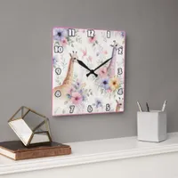 Giraffes roam through bright African blooms Square Wall Clock