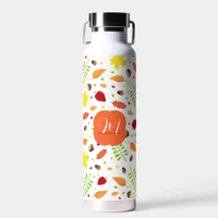 Colorful autumn leaves and nuts water bottle