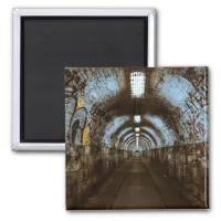 Empty Train Tunnel with Graffiti Magnet