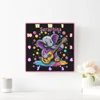 Playful elephant strumming a guitar with joy square wall clock