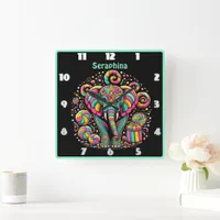 A vibrant elephant surrounded by colorful sweets square wall clock