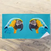 Parrot portrait on a turquoise background beach towel