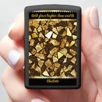 Gold fragments on a dark surface zippo lighter