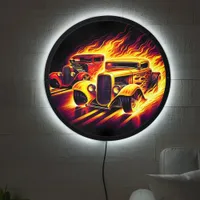 Classic hot rods racing through fiery trails LED sign