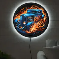 Classic hotrod blazing through flames at night LED sign