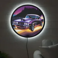 Vivid hotrod cruising along a scenic twilight road LED sign