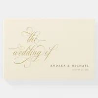 Elegant Calligraphy Script Cream and Gold Wedding Guest Book