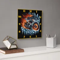 Fiery motorcycles racing through icy mountains square wall clock