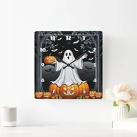 Halloween ghost surrounded by pumpkins and bats square wall clock