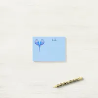 Pale blue birds in heart shape post-it notes