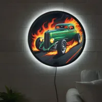 Hotrod racing down a fiery highway at sunset LED sign