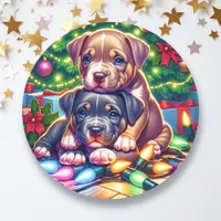 Two Cute Puppies Playing under the Christmas Tree Classic Round Sticker