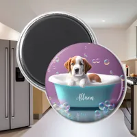 Cute puppy in a bathtub with soap bubbles magnet