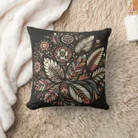 Floral and feather design on dark throw pillow