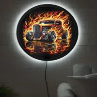 Vintage hotrod blazing through fiery reflections LED sign