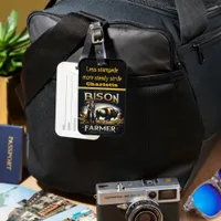 A Dedicated Farmer Tending to Bison in the Prairie Luggage Tag