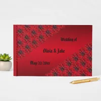 Blood red dahlias in gothic style wedding  guest book