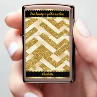 Gold zigzag pattern glows brightly zippo lighter