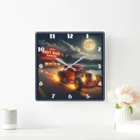 Hot rod drives by vintage garage at night square wall clock