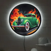 Vibrant hotrod roaring down a fiery highway LED sign