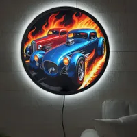 Classic hot rods racing with fiery backgrounds LED sign