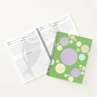 Pastel circles on a green background | notebook